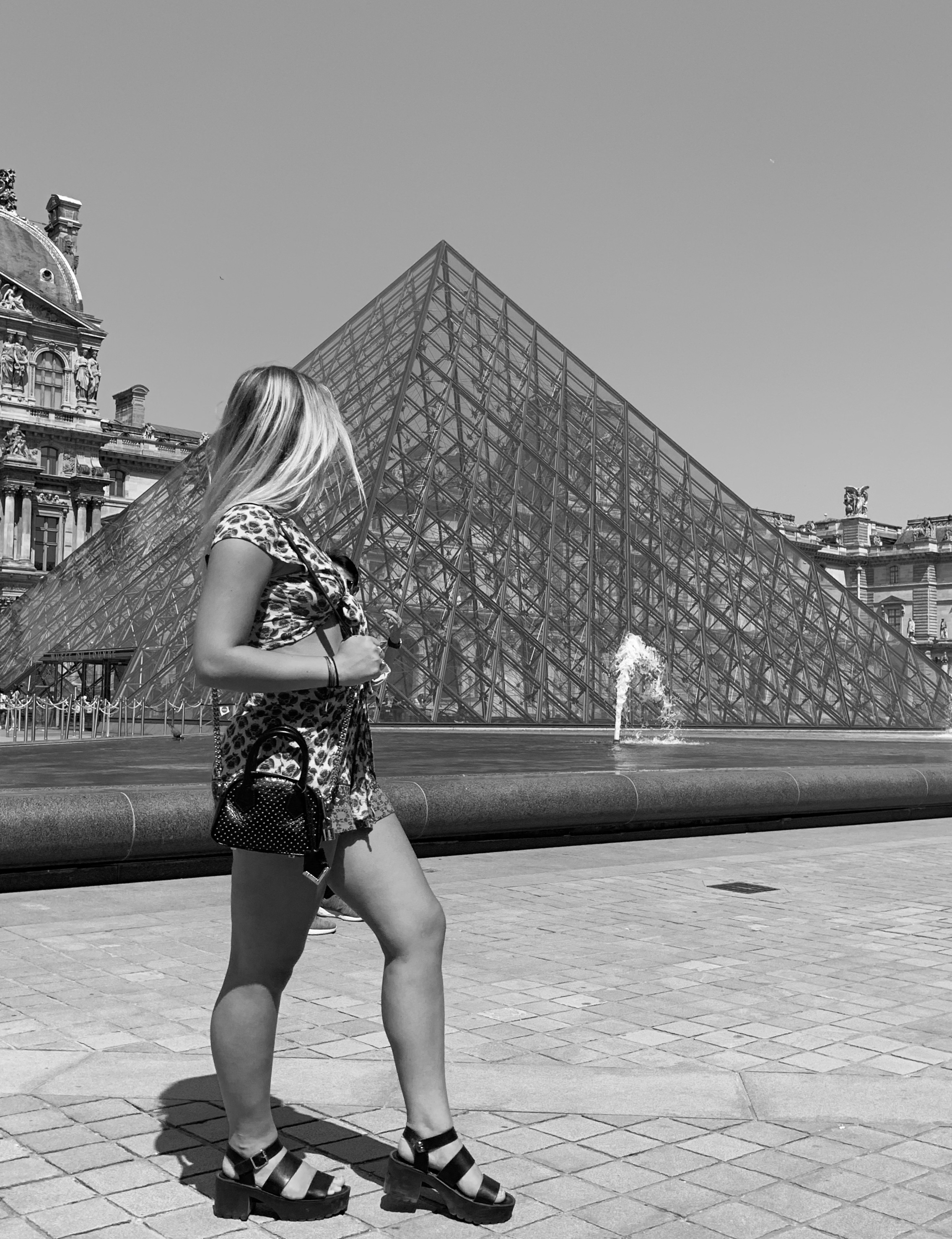 Natalie in front of the Louvre